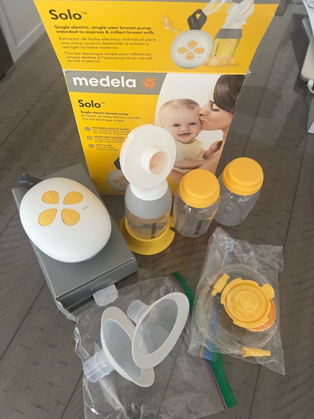 Medela Solo Electric Breast Pump with Yellow Accents and White Controls